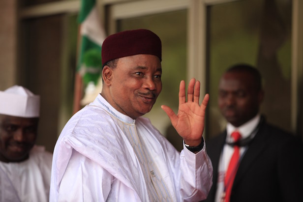 Niger's President Mahamadou Issoufou arrives for a summit to address a seminar on security during an event marking the centenary of the unification of Nigeria's north and south in Abuja, Nigeria, Thursday, Feb. 27, 2014, . (AP Photo/Sunday Alamba)
